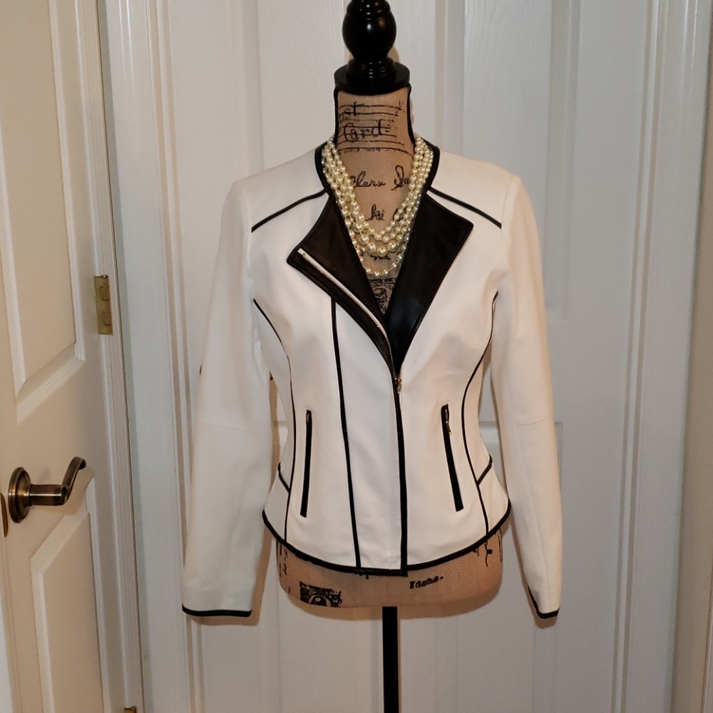 Cream jacket with black faux leather trim